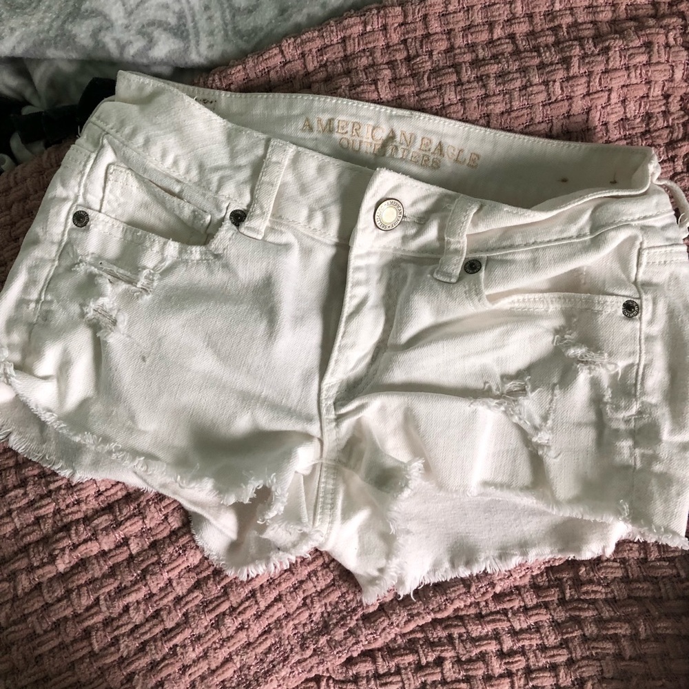distressed white shorts